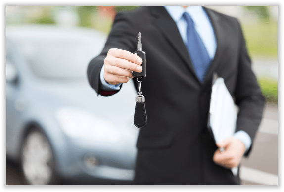 Inspector with tablet checking car